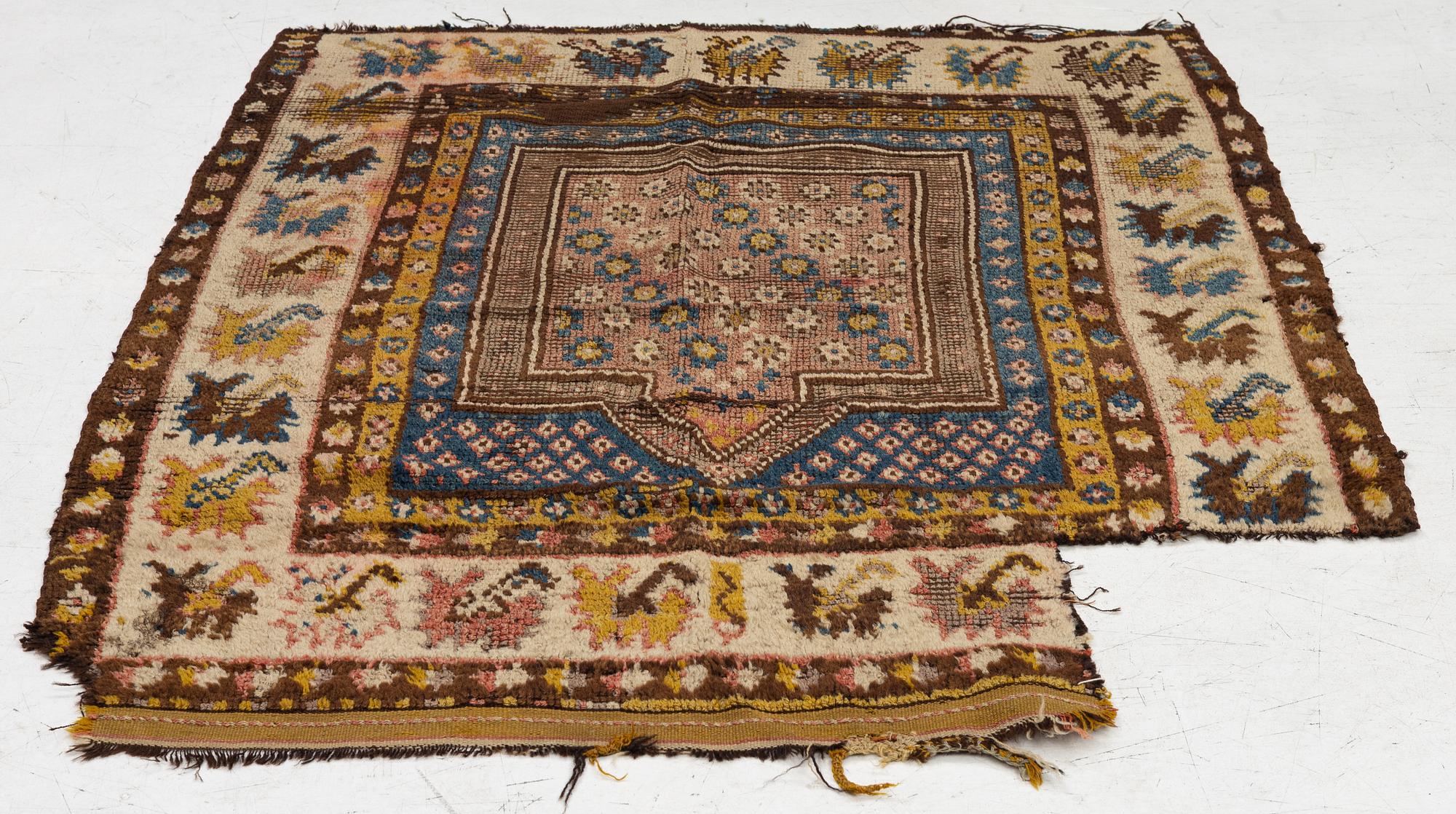 An antique Monastir prayer rug fragment , Ottoman Empire, c 133 x 106 cm.