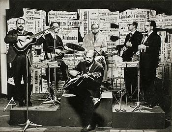 A SIGNED BLACK AND WHITE PHOTOGRAPH DEPICTING SWEDISH COMEDY GROUP "SKÄGGEN" CIRCA 1963.