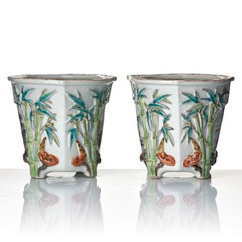 A pair of Chinese famille rose flower pots, 20th Century.