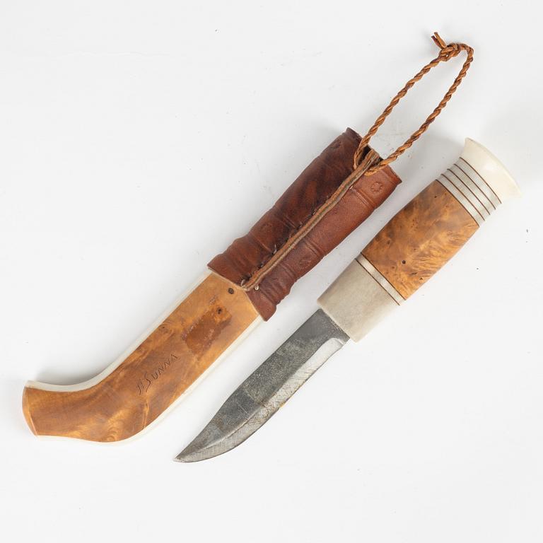 A reindeer horn knife by Anders Sunna, signed.