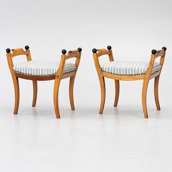 A pair of late Empire stools, mid-19th century.