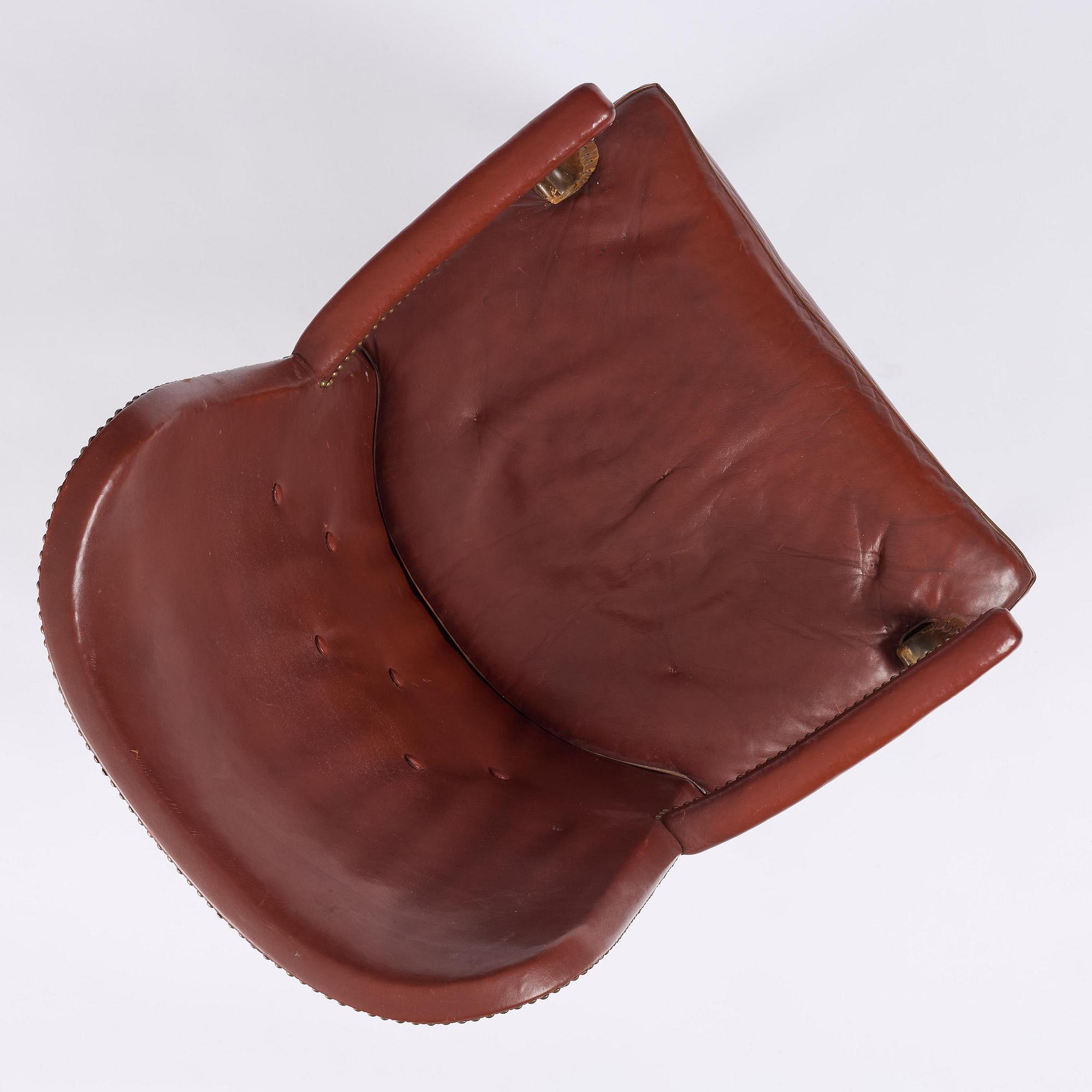 Axel Einar Hjorth, a "Caesar" stained birch and leather armchair, Nordiska Kompaniet, Sweden, 1929.