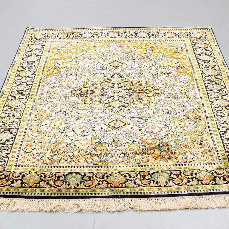 A RUG, silk Qum, ca 210 x 136 cm.