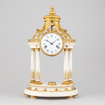 A Louis XVI marble and gilt bronze mantel clock, late 18th Century.