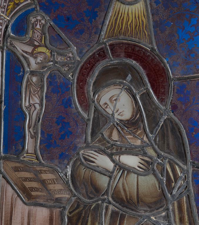 A stained glass window with St Theresa, late 19th Century.
