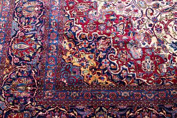 An antique silk Kashan carpet, central Persia (Iran) c. 378 x 259 cm.