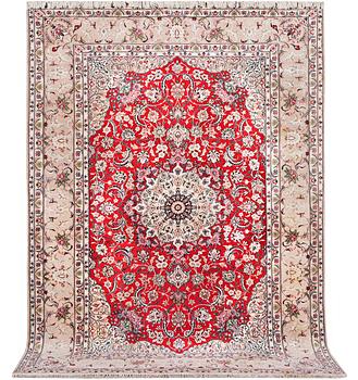 An Esfahan carpet, part silk, signed Rahimi, c. 298 x 206 cm.