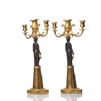 A pair of Empire 19th century three-light candelabra,  Russia.