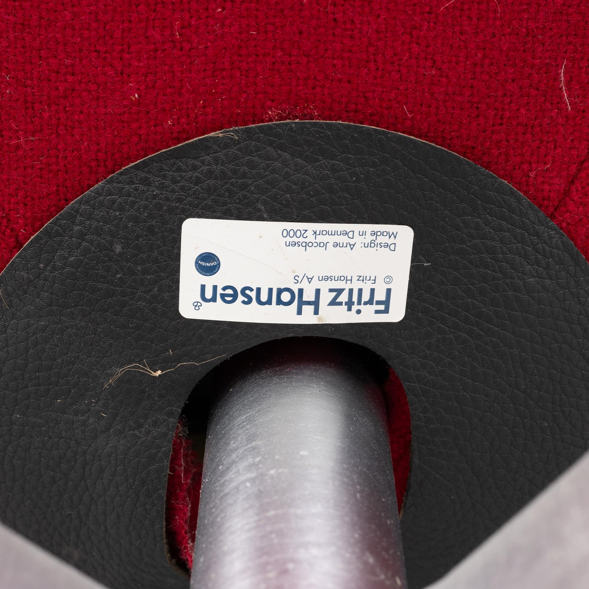 Arne Jacobsen, an armchair with footstool, "The Egg", Fritz Hansen, Danmark, 2000.