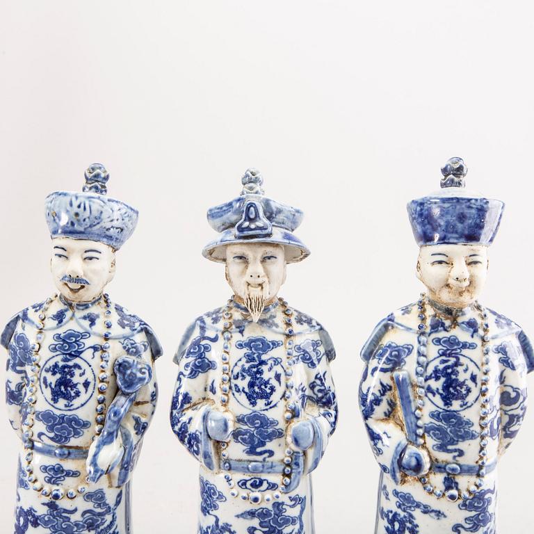 A set of three Chinese porcelain figurines.