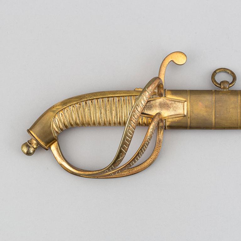 An Imperial Russian gold sabre for Bravery, 1855 naval pattern, Zlatoust factory, with scabbard.