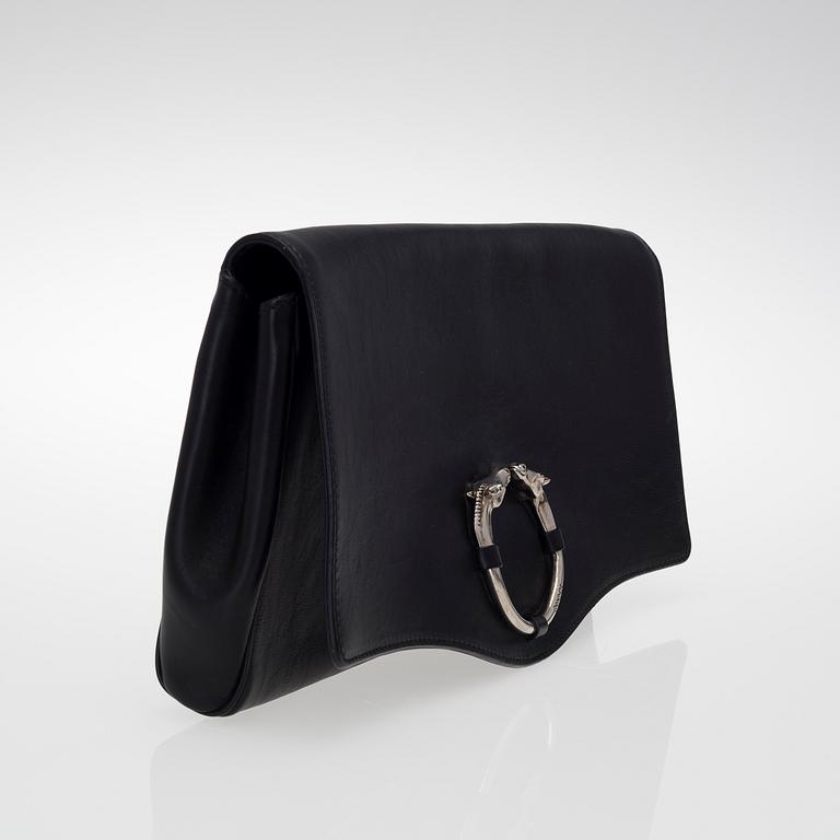 A LEATHER RIBOT HORSE HEAD CLUTCH.