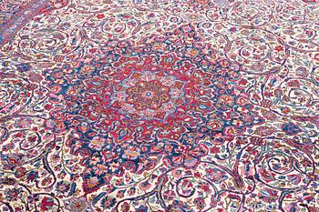 An antique silk Kashan carpet, c. 378 x 259 cm.