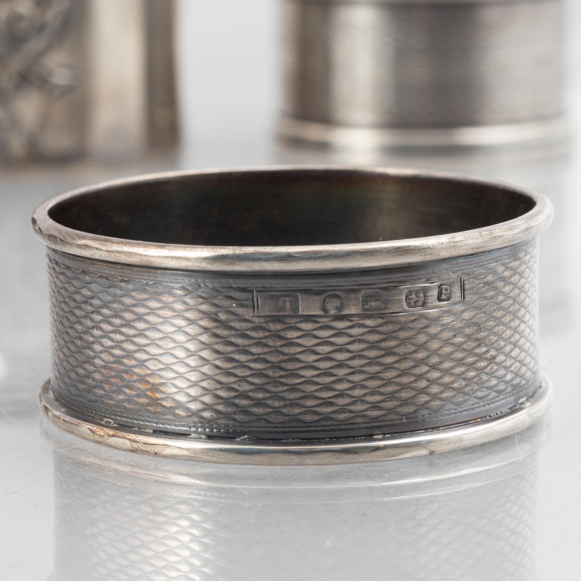 A collection of silver napkin rings, mostly England, Denmark (46 pieces).