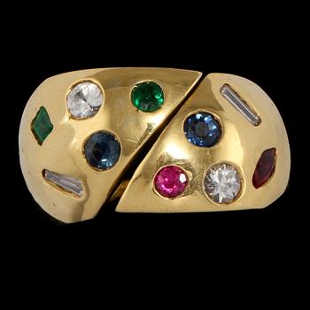 RING, 18k guld med fasettslipade rubiner, blå safirer och smaragder samt baguett och briljantslipade diamanter. Vikt 8 g.