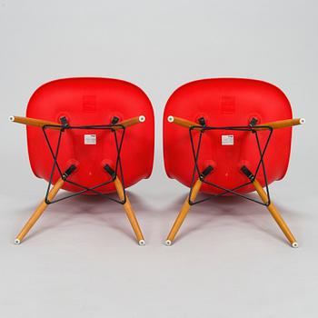 Charles & Ray Eames, two 'Plastic Chair DSW' chairs, Vitra.