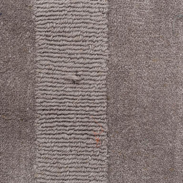 A Layered "Wool Cubes" carpet, 390x620 cm.