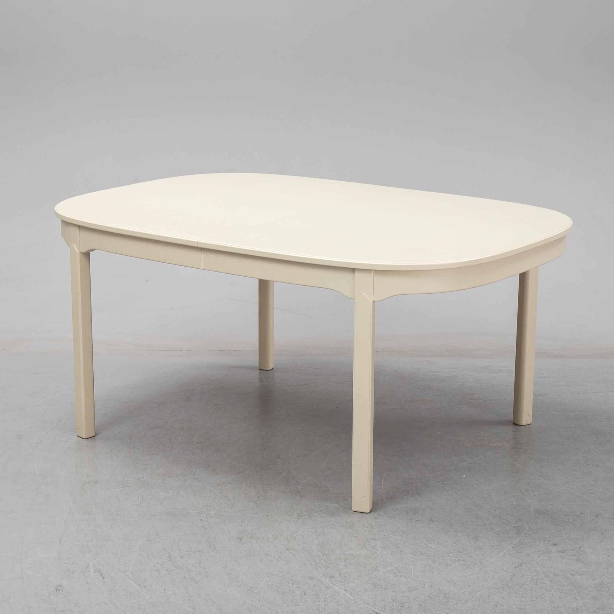 A second half of the 20th Century 11 pcs dining set by Carl Malmsten. Åfors möbelfabrik.