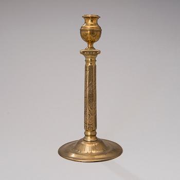 A brass candlestick from Flanders / Germany of the turn of the 17th century.