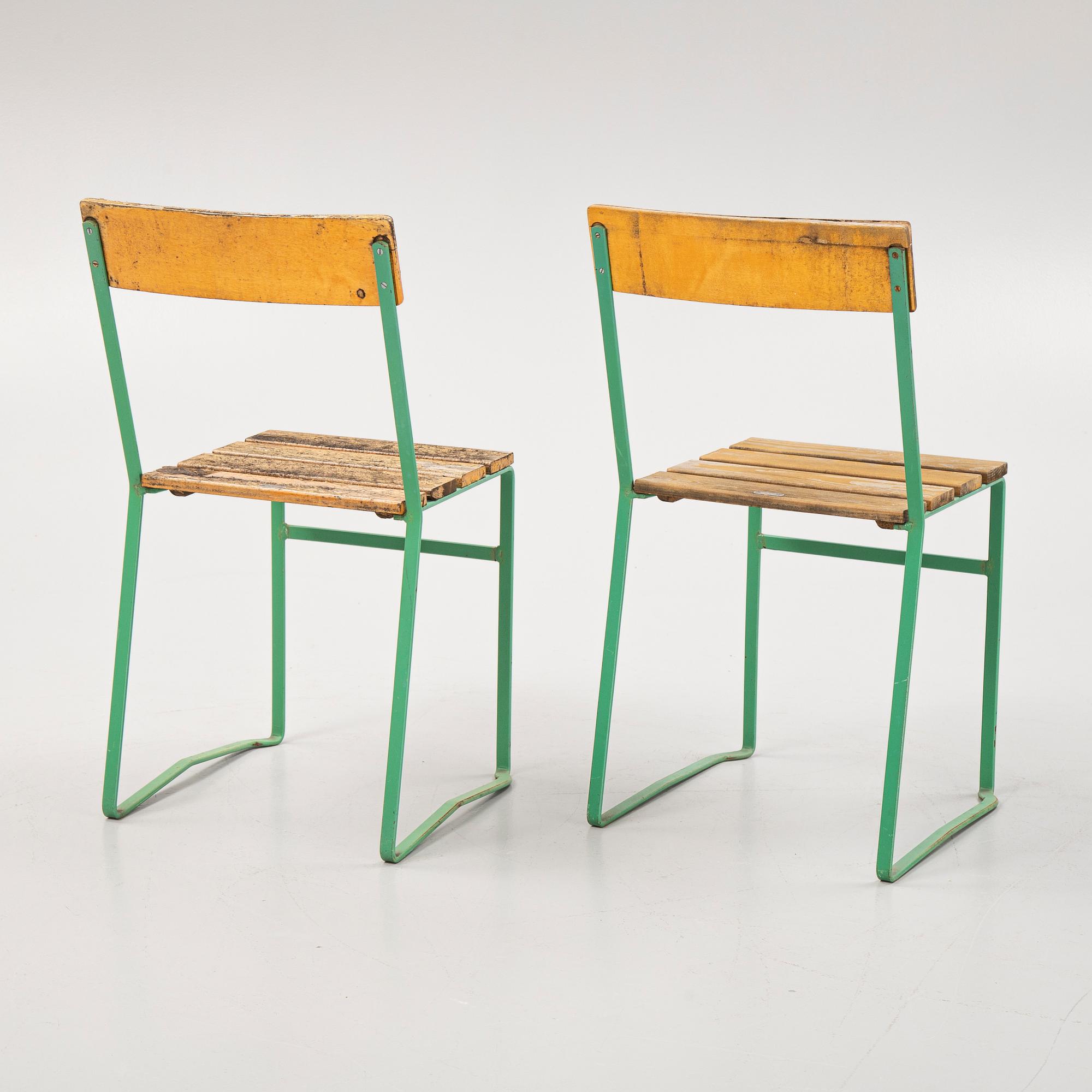 A pair of garden chairs, a version of modell 6, Grythyttan, Sweden, mid 20th century.