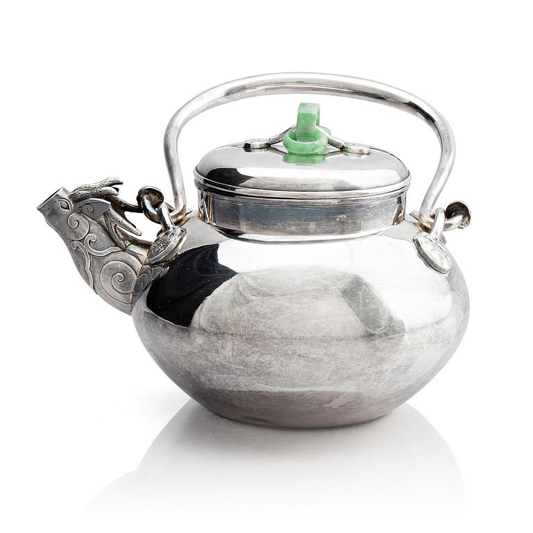 A silver tea pot with cover, Japan, early 20th century.