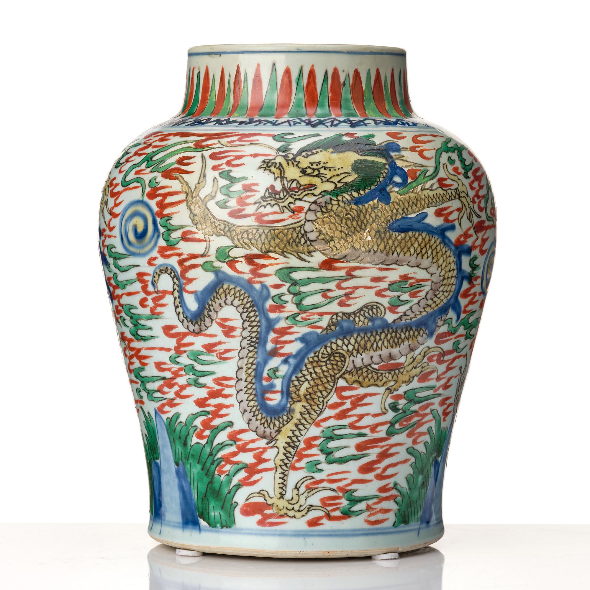 A matched pair of Transitional Wucai jars, 17th Century.