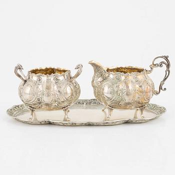 A silver Rococo style creamer, sugar bowl and tray, Gewe Silvervarufabriken Ab, Malmö, Sweden, 1970-71.