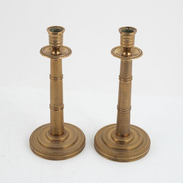 Candlesticks, a pair, Empire style, 20th century.