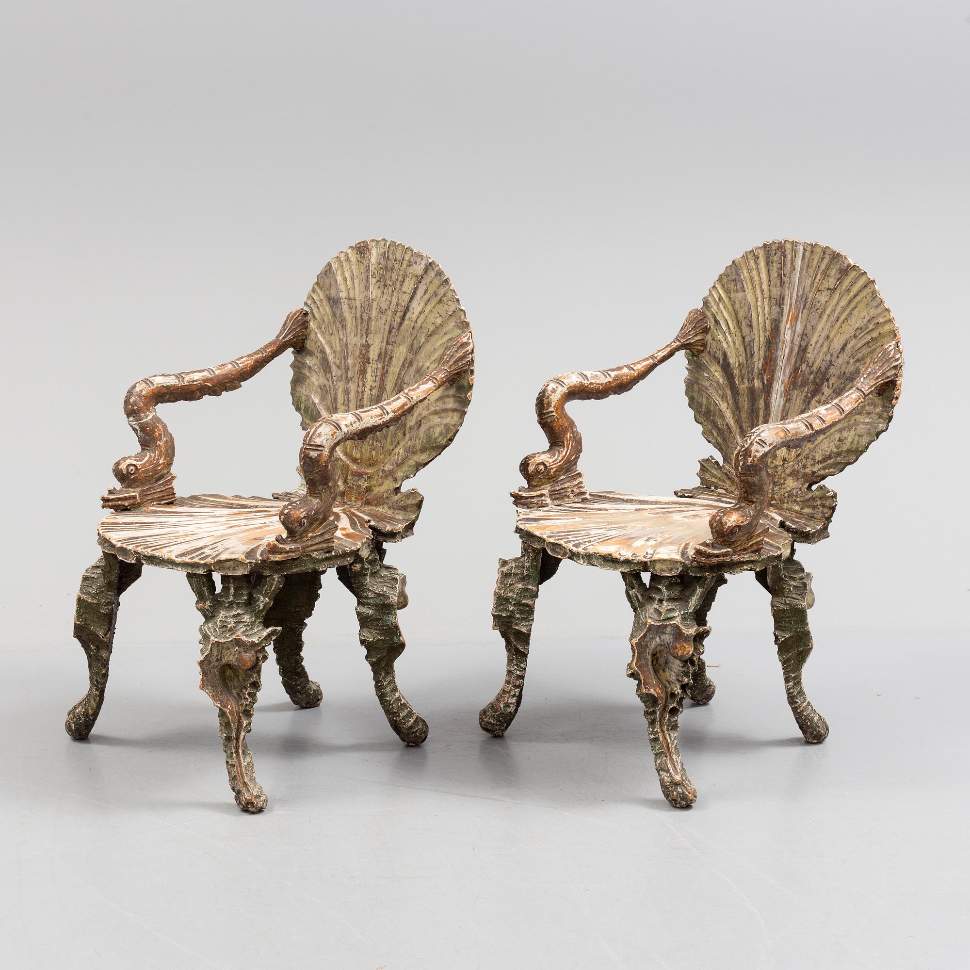 A pair of 20th century grotto armchairs.