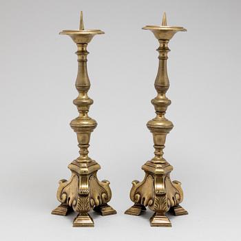 A pair of 17th century bronze candlesticks.