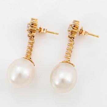 Cultured South sea pearl and brilliant-cut diamond earrings.