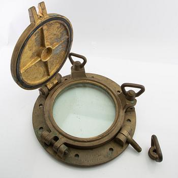 Vent / ship's window, dated 1966.