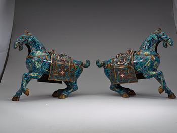 A pair of Chinese cloisonné figures of horses, presumably early 20th Century.