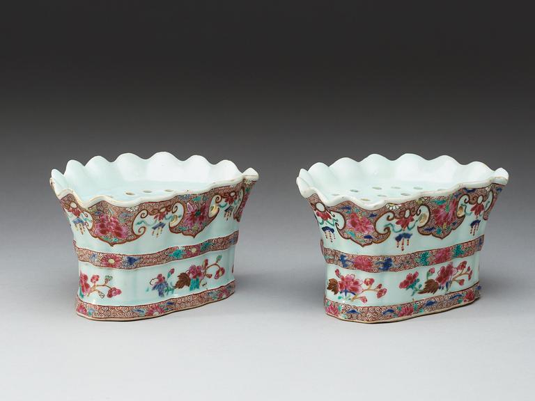 A pair of famille rose wall-tulip vases, Qing dynasty, Qianlong (1736-95).