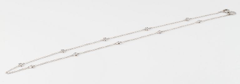 COLLIER, 18K vitguld med 10 briljantslipade diamanter ca 0.25 ct. Vikt 3,3 gram.