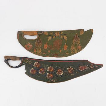Two Swedish painted wooden knives, first half of the 19th Century.