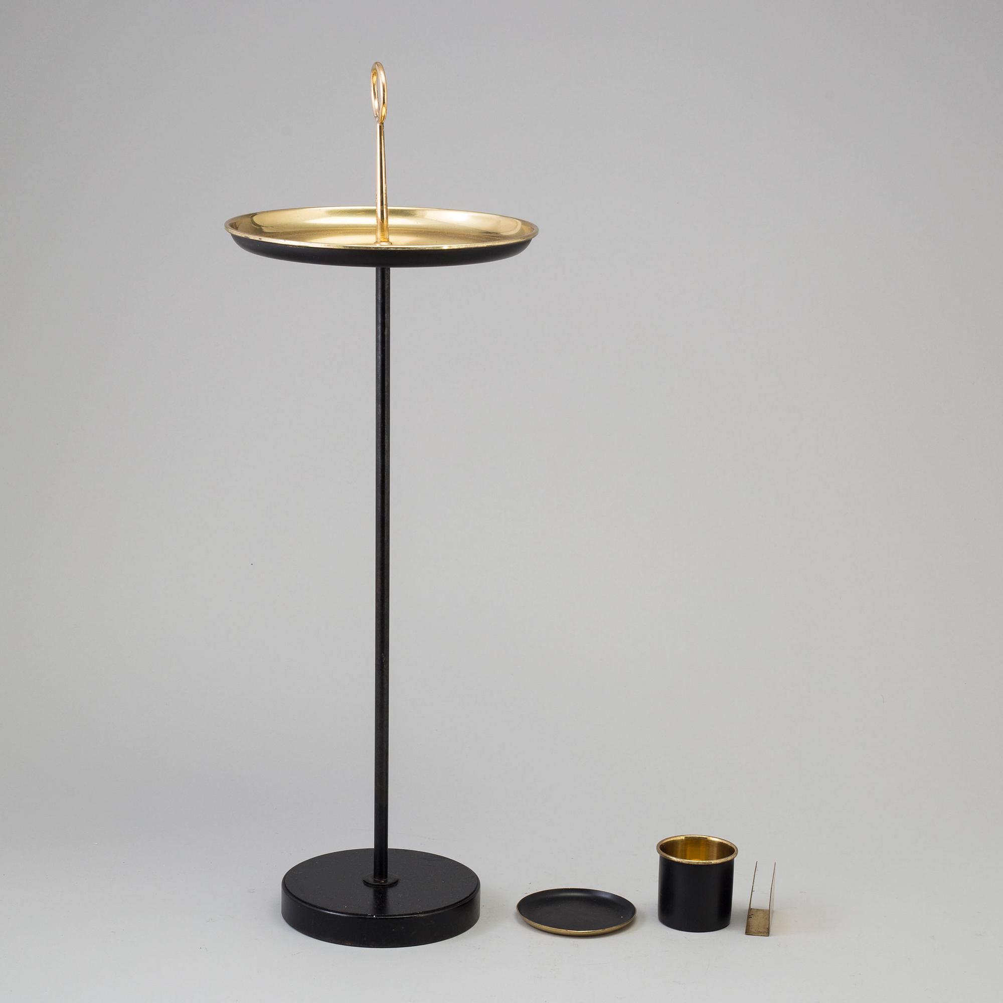 GUNNAR ANDER, a brass and iron table from Ystad-Metall, mid 20th Century.