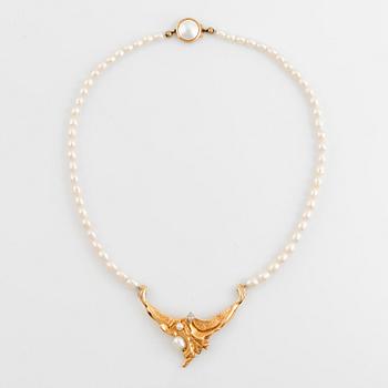 Cultured freshwater pearl necklace, with navette cut diamond and brilliant cut diamonds.
