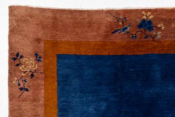 A Chinese art deco carpet, c. 327 x 278 cm.