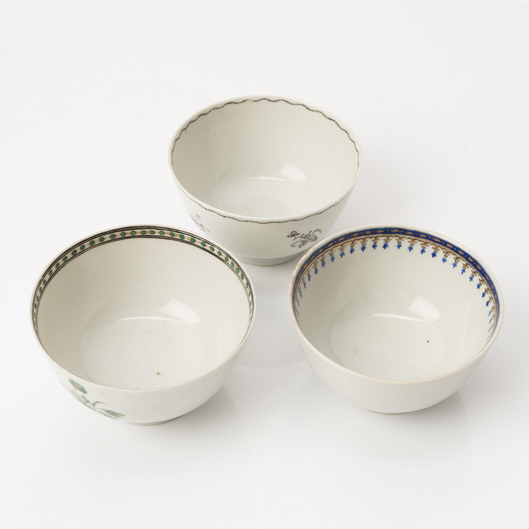 A group of nine Chinese export porcelain cups with stands, Qing dynasty, late 18th century.