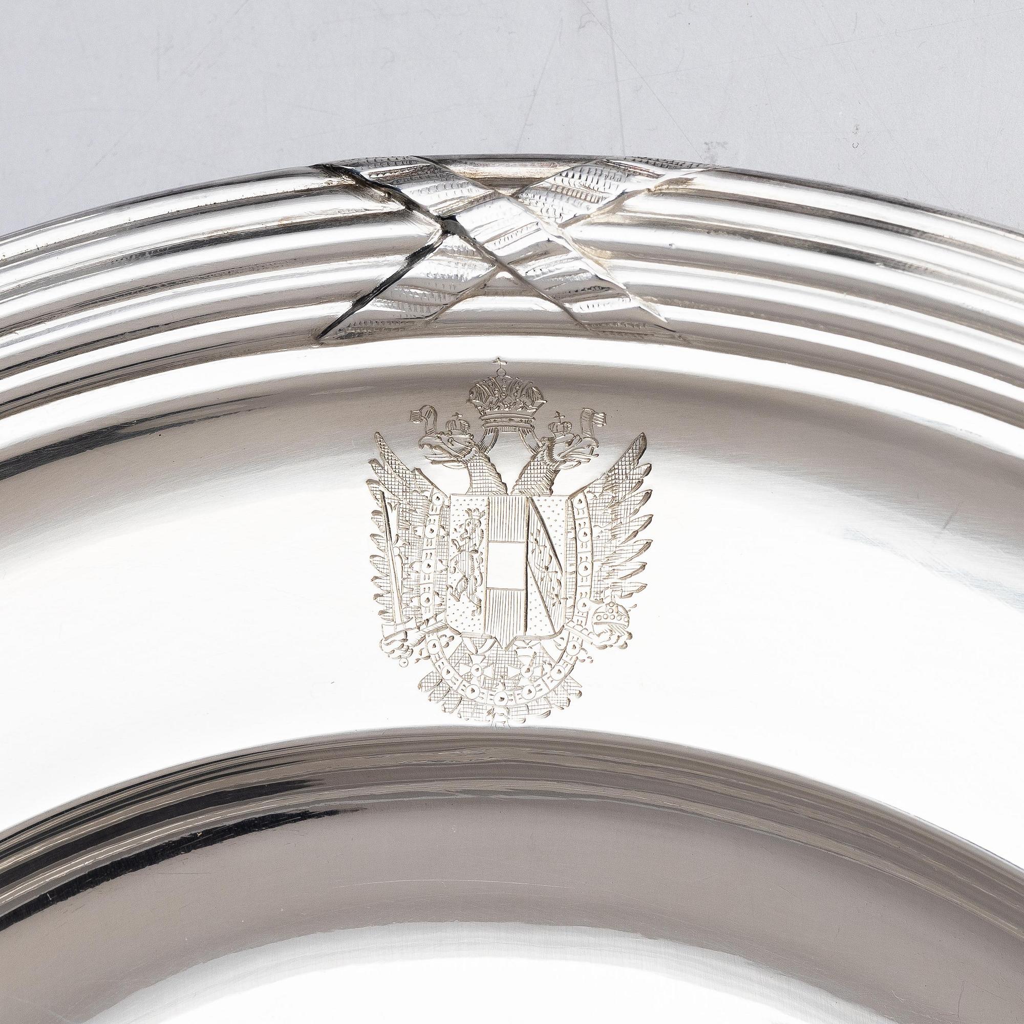 Twenty-one French silver dinner plates, marks of Maison Odiot, Paris, France, second half of the 19th century.