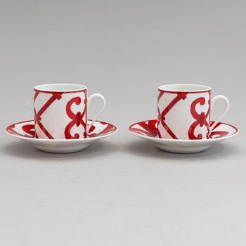 HERMÉS Two porcelain espresso cups with saucers.