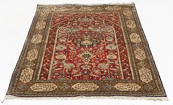 A rug, silk Quum, ca 174 x 103 cm.