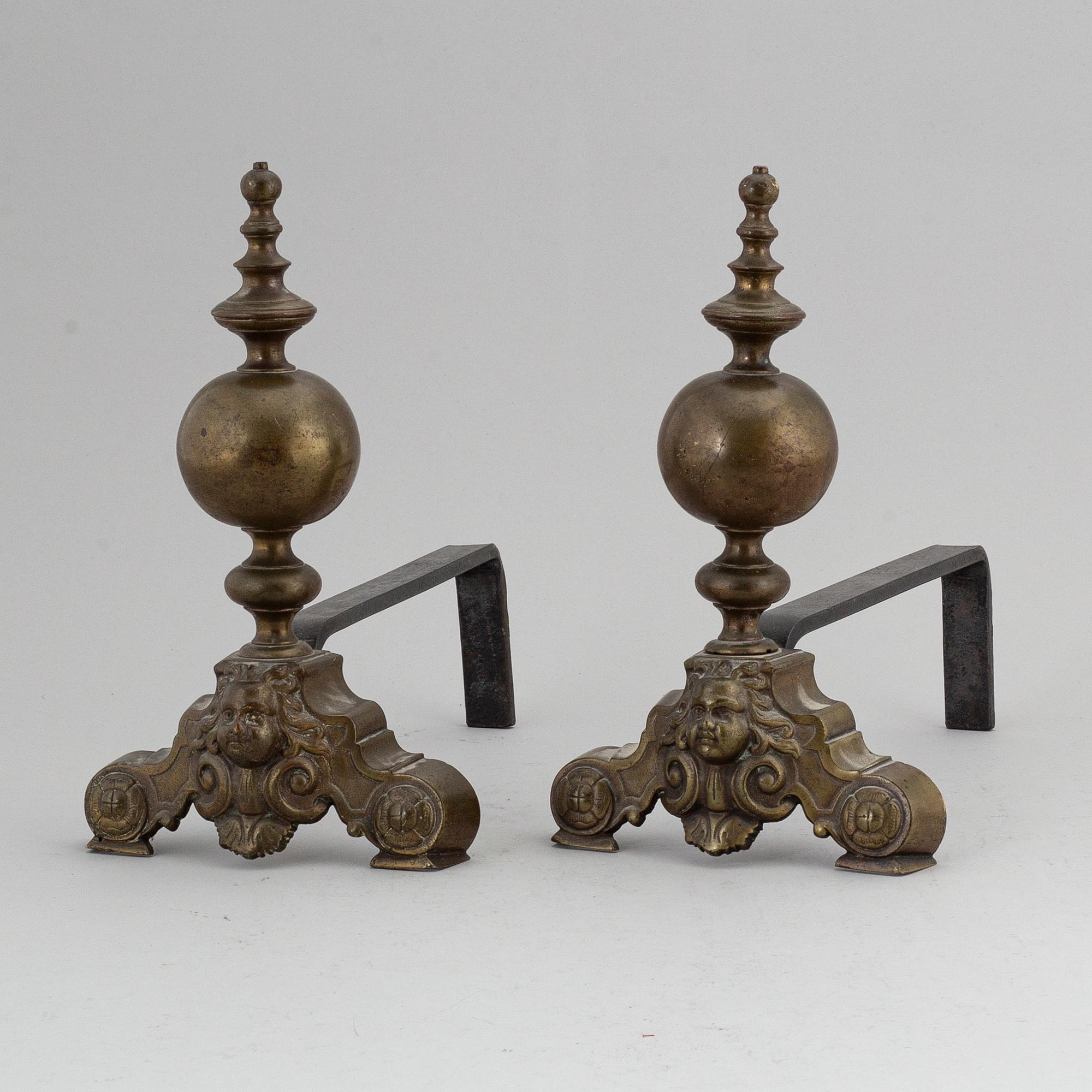 A pair of Louis XVI-style brass andirons.