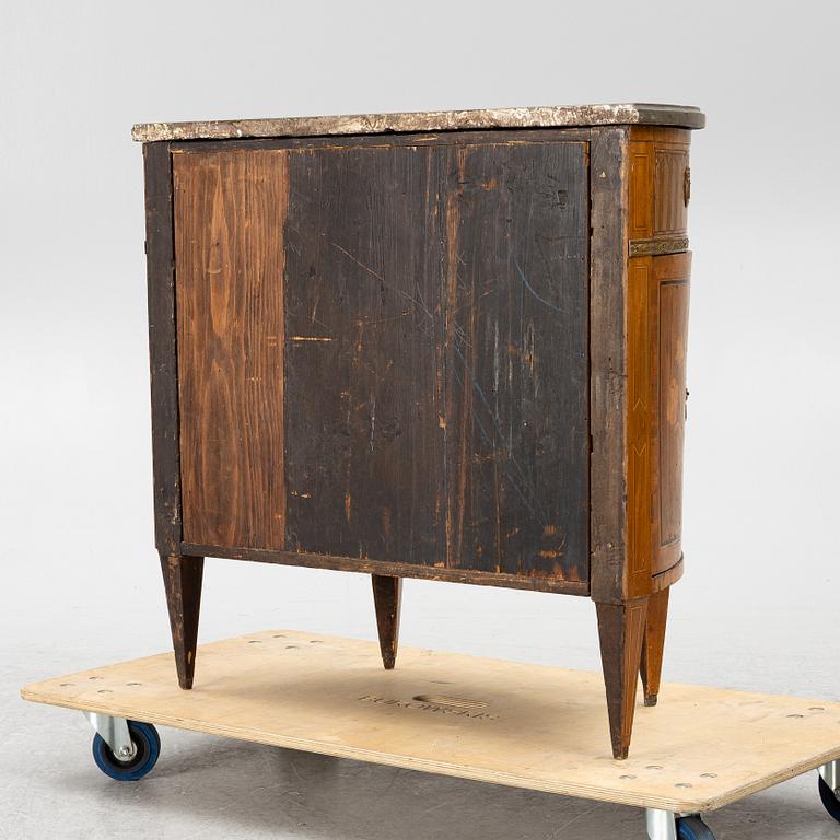 A Louis XVI style chest of drawers, 19th century.