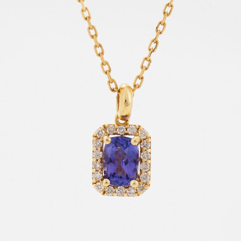 An 18K gold necklace set with a faceted tanzanite.