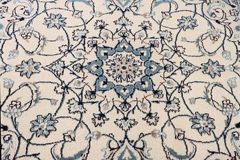 A Nain crug, part silk, c. 200 x 193 cm.