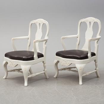 A pair of rococo style chairs, first half of the 20th century.