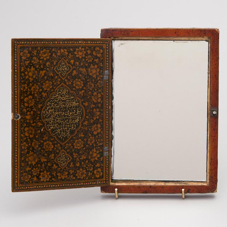 A 19th century polychrome lacquered papier maché mirror case, Qajar, Iran.