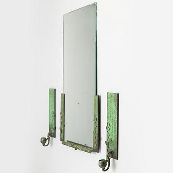 a mirror with two wall sconces, 1920's-30's.